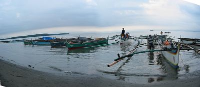 fishing boats along the beach